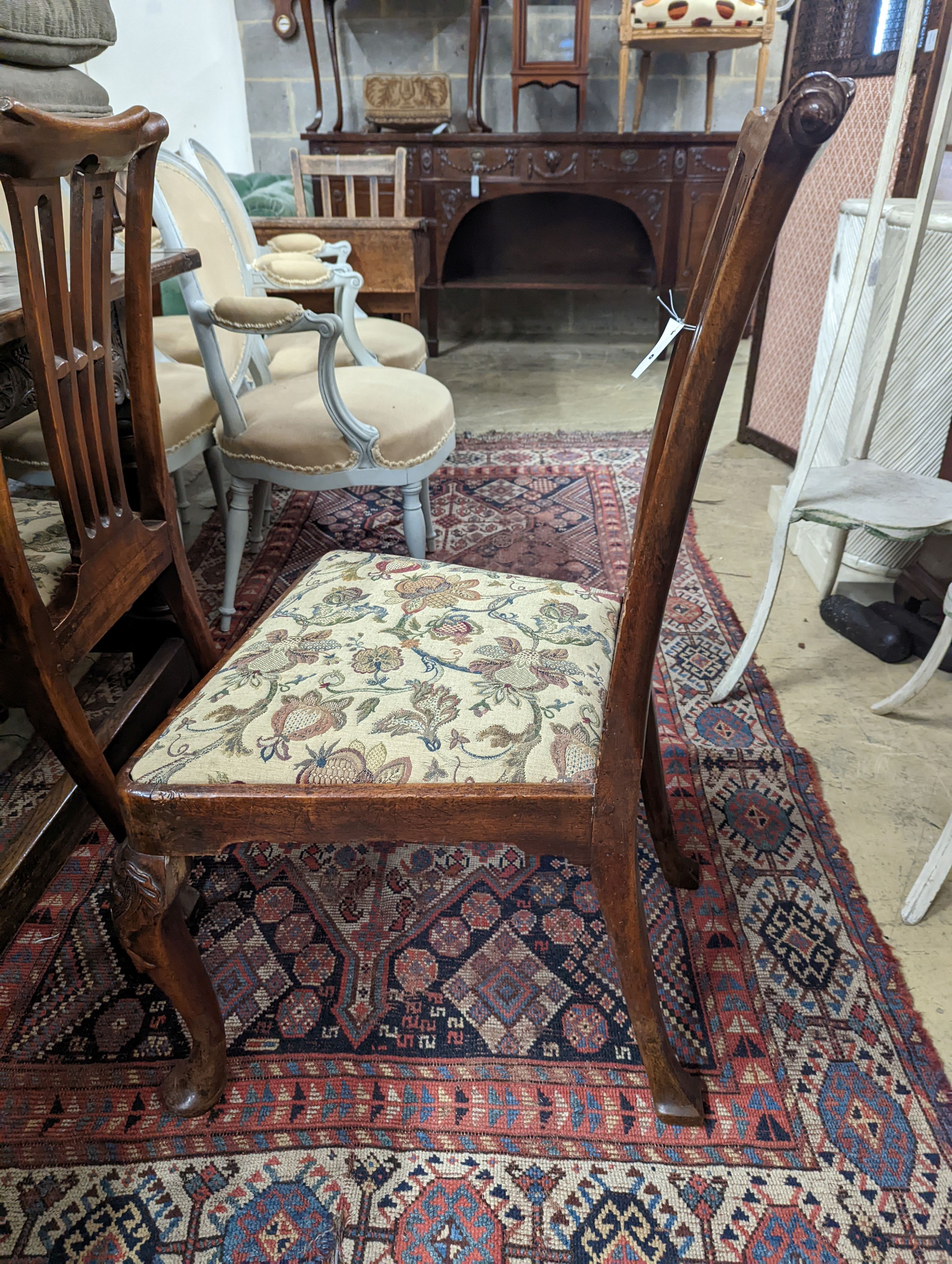 A pair of mid 18th century mahogany dining chairs